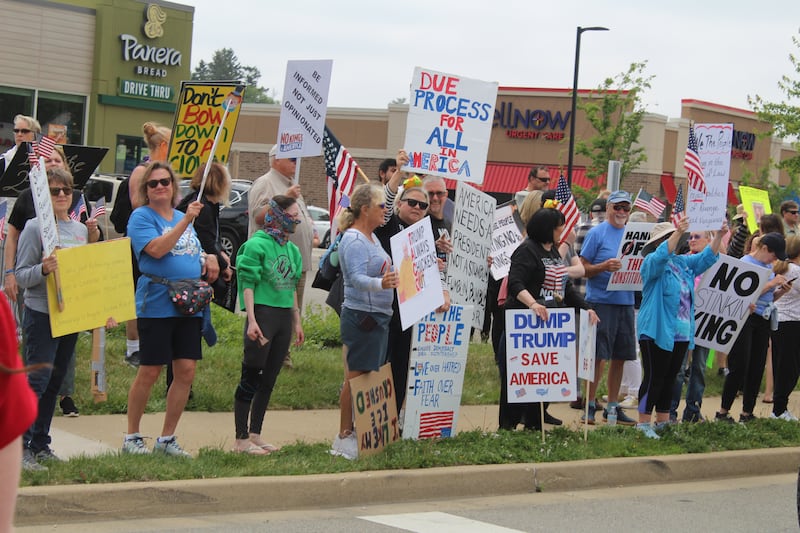 Thousands of protesters line up along Route 31 on June 14, 2025 during a "No Kings" protest in McHenry.