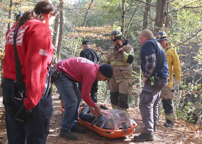 Utica and Oglesby firefighters and paramedics transport a 16-year old male who fell approximately 30 feet in the area of Cedar Point overlook on Friday, Oct. 24, 2025  at Matthiessen State Park in Oglesby. Utica and Oglesby Fire and EMS responded to the park just before 1p.m. The 16-year old patient from Elmhurst, fell down part of an embankment. Rescuers transported him to the Matthiessen shelter using a six-wheeler and then transferred by ambulance to OSF St. Elizabeth Peru. The patient suffered non-life-threatening injuries.