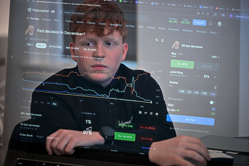 University of Chicago freshman Oliver Wilson analyzes interest rates bets on the Polymarket prediction market platform in his Hyde Park apartment late last year. Polymarket CEO Shayne Coplan has pledged $20,000 to kickstart Wilson’s prediction market club at his university.