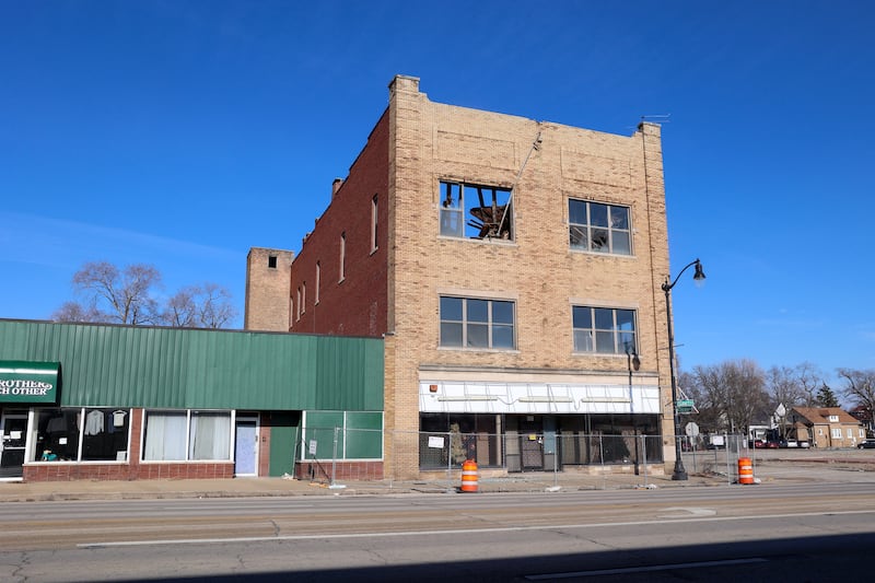 The sky can be seen through the collapsed roof at the 591-599 E. Court St. property in Kankakee. Deemed a significant public safety risk, a temporary chain link fence has been put in place around the perimeter and the city is seeking an owner willing and able to rehab this structure.