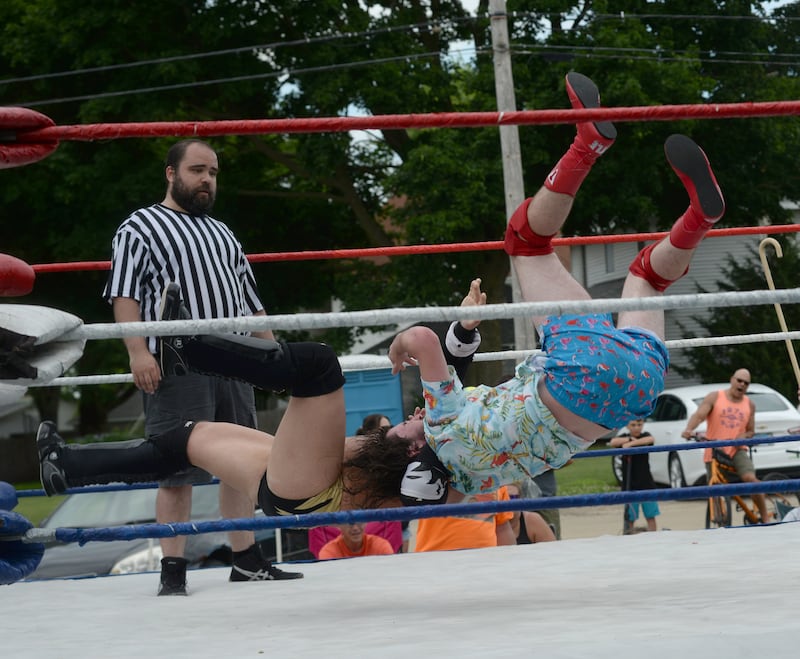 T-Money and Scotty Keyes battle in the Zowa wrestling ring during Town & Country Days on Saturday June 28, 2025.