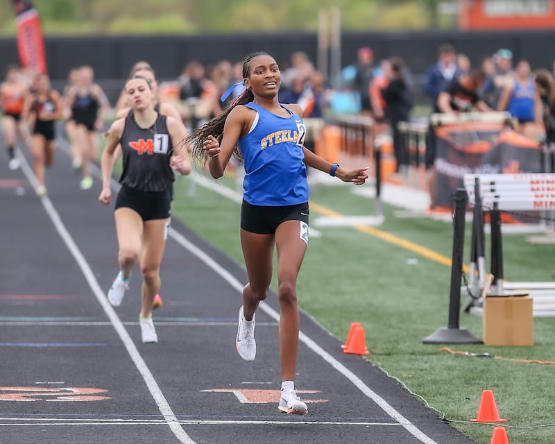 Joliet Central's Madison King (2) wins the 800m during Southwest Prairie Conference Girls Track and Field Meet Wednesday, May 7, 2025 in Minooka.