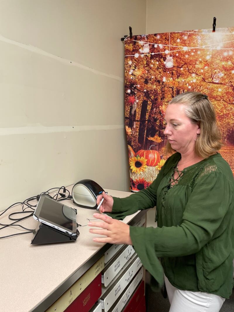 La Salle County voters will notice new electronic poll books the next time they report the polls. These devices will facilitate voter registration and replace the aged devices including the one seen in this demonstration photo Monday, Sept. 8, 2025, with Clerk Jennifer Ebner.