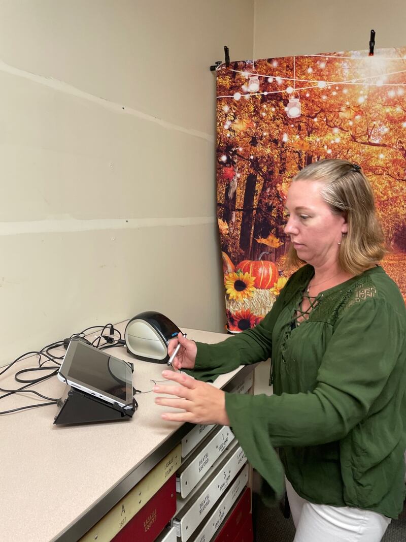 La Salle County voters will notice new electronic poll books the next time they report the polls. These devices will facilitate voter registration and replace the aged devices including the one seen in this demonstration photo Monday, Sept. 8, 2025, with Clerk Jennifer Ebner.