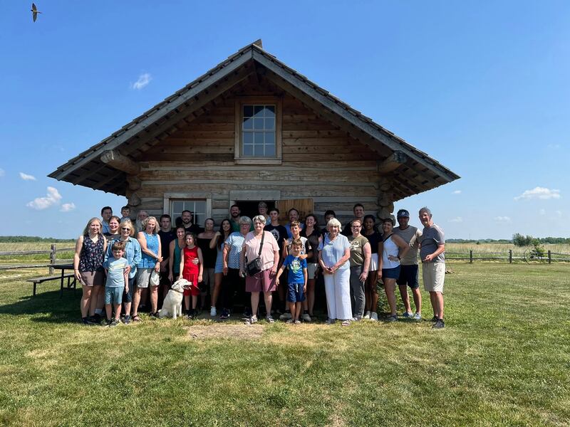 A total of 31 people and one canine attended the Burgess Reunion held at Goose Lake Prairie State Natural Area’s Cragg Cabin. This rendition of the cabin was built by Todd Daggett, assisted by his father.
