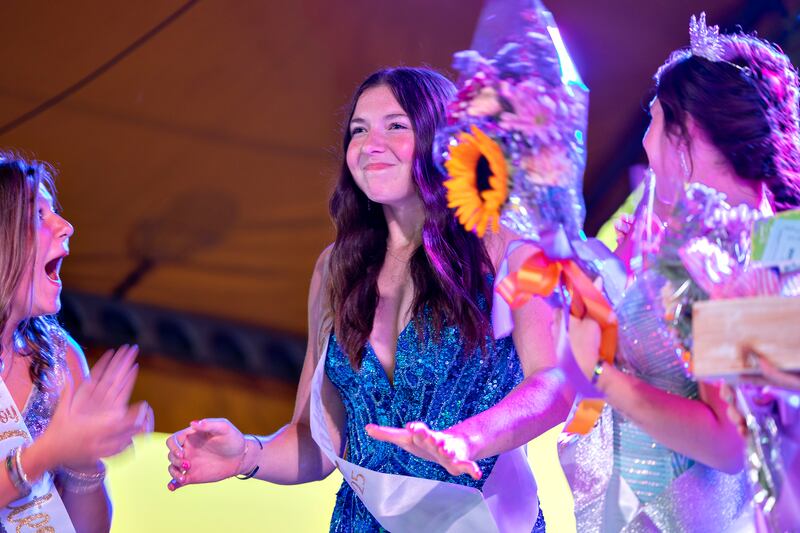 Kiera Karlson, a senior at Amboy High School, beams with pride after being named 2025 Miss Amboy on Thursday, Aug. 21, 2025. The event kicked off Amboy's Depot Days.