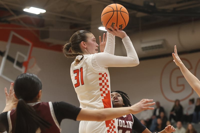 Minooka’s Madelyn Kiper takes a mid-shot against Moline in the Class 4A Minooka Regional championship game on Thursday, Feb. 19, 2026 in Minooka.