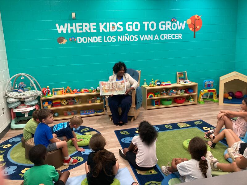 Will County Circuit Court Judge Colette Safford reads "Coat of Many Colors" by Dolly Parton to children after the launch event for Imagination Library in Will County.
Monday, July 28, 2025.