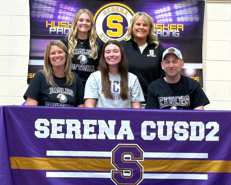 Recent Serena graduate and Times All-Area Softball first-teamer Maddie Glade (seated at center) has committed to continue her education at Illinois Valley Community College in Oglesby and her softball career at the NJCAA Division II level with the Eagles. She is pictured here at her signing ceremony surrounded by family and Serena softball coach Kelly Baker (standing at right).