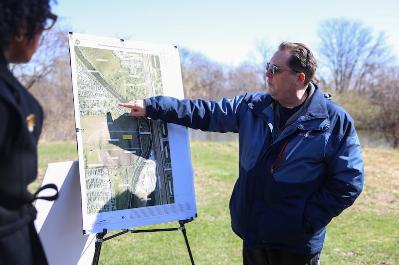 Plainfield Park’s Director of Planning Bob Collins explains a map of the proposed Bentley Road pathway to U.S. Rep. Lauren Underwood, D-Naperville, on Tuesday, April 7, 2026 in Plainfield. The Plainfield Park District is in the very early stages creating a four mile pathway, a vital link between Riverside Parkway, Sunset Park, and Hammel Woods trails along the DuPage River corridor.