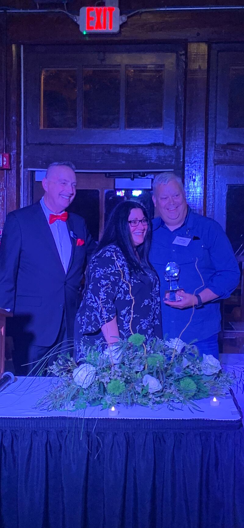 Ottawa Chamber Executive Director Jay McCracken, left, Chairman Carrie Herro, center, and DeWayne Cronkright who received the coveted Leo Parkerson Award.