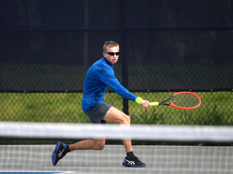 Johnsburg’s Tyler Batt returns the ball during the first round of the 1A boys state tennis meet on Thursday, May 29. 2025 at Buffalo Grove High School.