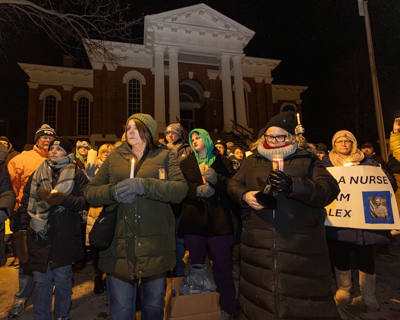 Concerned citizens protest ICE whilst honoring those who've died in the Minneapolis protests on Wednesday, January 29, 2026 at 1004 Columbus Street in Ottawa. The Vigil was organized by Illinois Valley Indivisible in light of the recent deaths caused by ICE agents in Minneapolis, Minnesota.