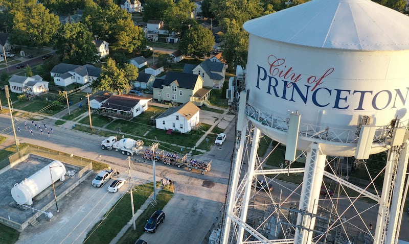 The Princeton High School football team rides during the homecoming parade on Thursday, Sept. 25, 2025 along South Main Street in Princeton .
