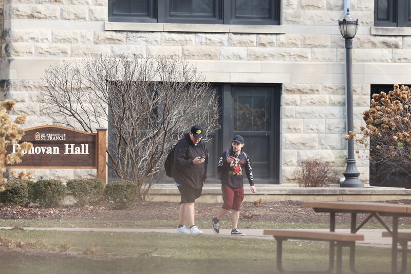University of St. Francis students wear shorts on campus as temperatures reach the 60’s on Wednesday, Feb. 21, 2024 in Joliet.
