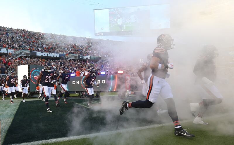 Members of the Chicago Bears take the field against the Buffalo Bills on Sunday, Aug. 17, 2025 at Soldier Field in Chicago.