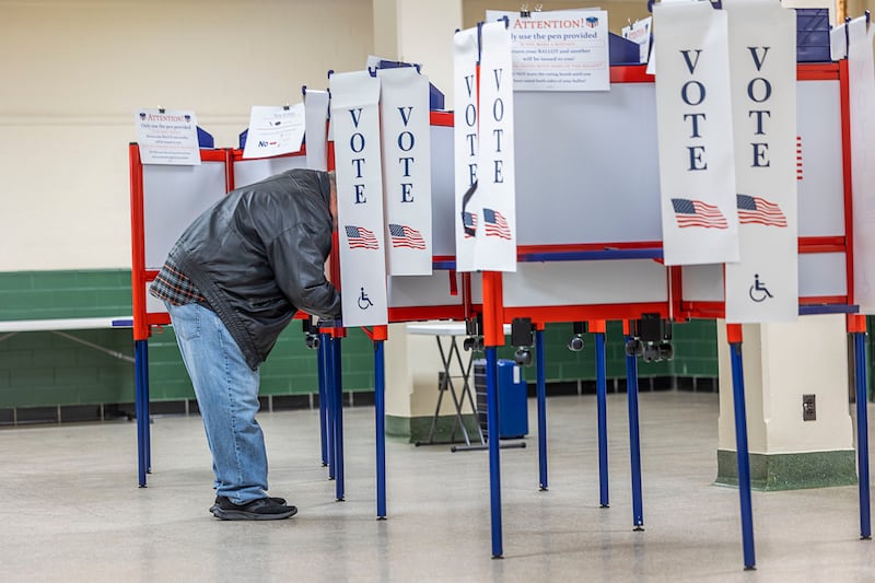 Ben Taylor of Dixon fills out his ballot Tuesday, March 17, 2026, at the Loveland House. Election judges saw slow voter turnout for this March primary.