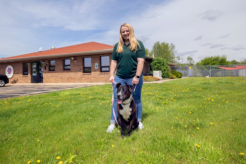 Granny Rose volunteer Jayden Bonnell takes Lehman for a walk Friday, April 24, 2026, from Granny Rose Animal Shelter.
