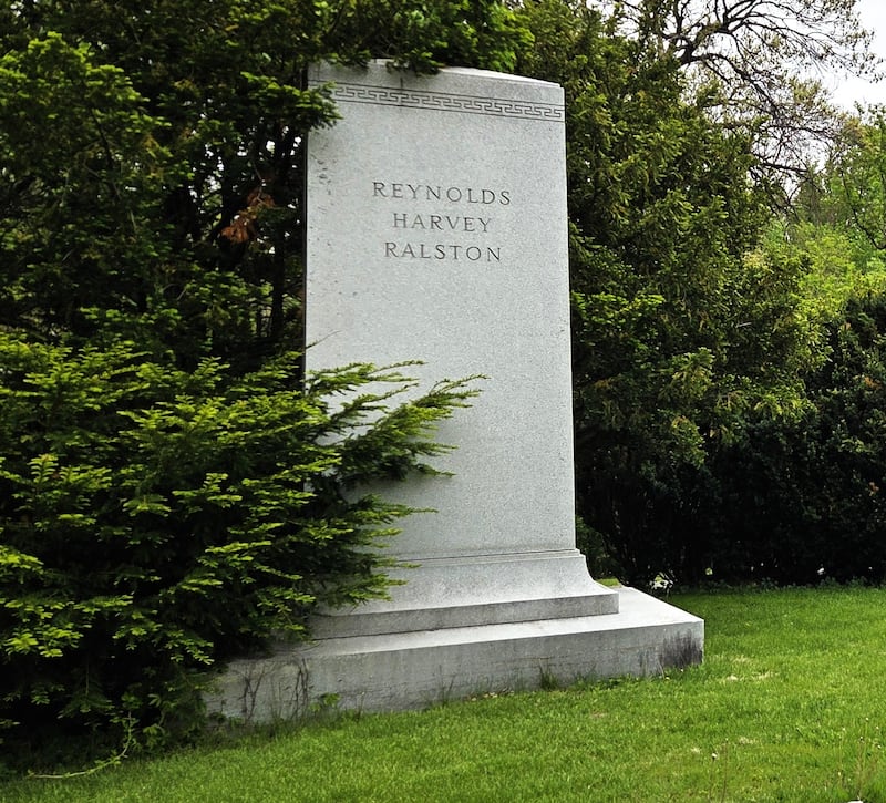 A 12-foot monument at Oakwood Cemetery marks Horace Reynolds's grave.