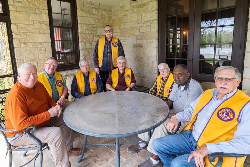 Led by current president Thomas Halla (standing), the Dixon Noon Lions Club accomplishes a lot for such a small group of members.