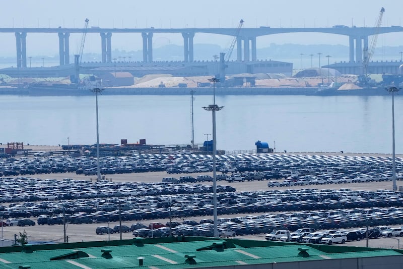 Vehicles for export are parked at a port in Pyeongtaek, South Korea, Friday, Aug. 1, 2025. (AP Photo/Ahn Young-joon)