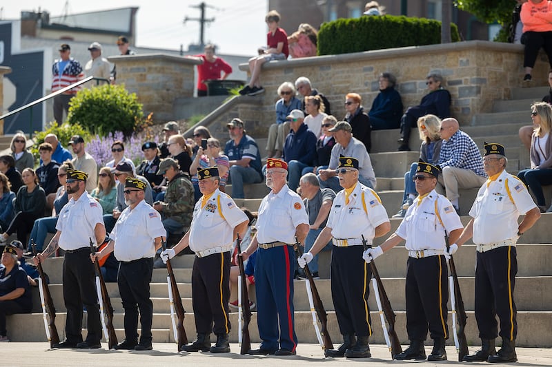 An honor guard stands at attention Monday, May 26, 2025, during a ceremony at the Dixon riverfront in recognition of Memorial Day.
