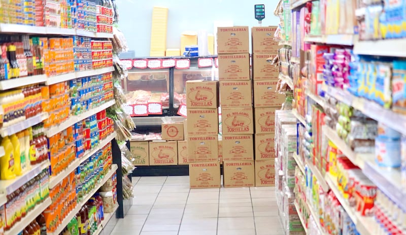 Condiments and canned goods line the shelves on Monday, Feb. 10, 2025, at DeKalb Fresh Market, 615 Oak St., DeKalb. Increased tariffs ordered by President Donald Trump's administration could impact local shoppers and businesses, including the price of groceries, experts have said.