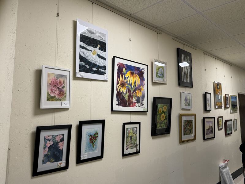The hallway outside the fellowship hall at First United Methodist Church at 118 Jackson St. in Morris is full of paintings from the Morris Watercolor Guild.