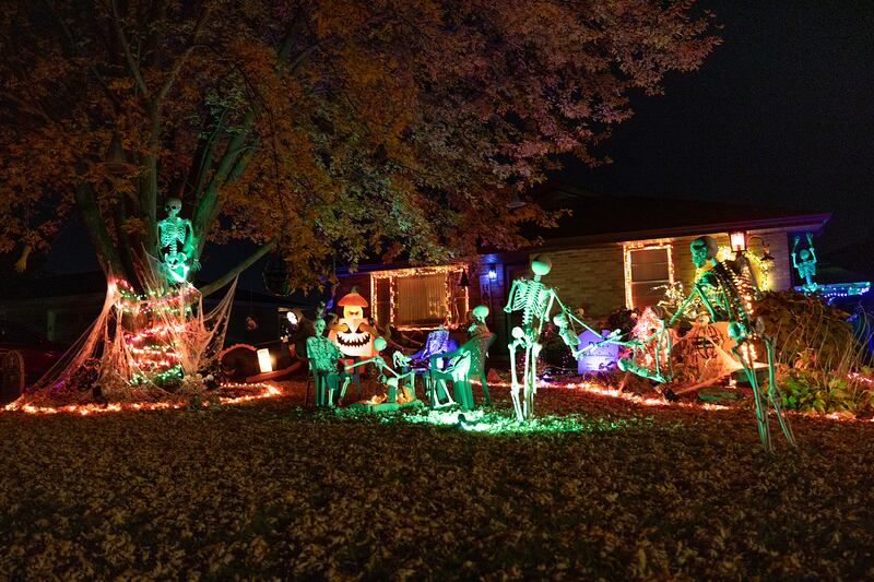 Several home along North Dement in Dixon has picture worthy Halloween scenes, including this one showing skeletons at play.