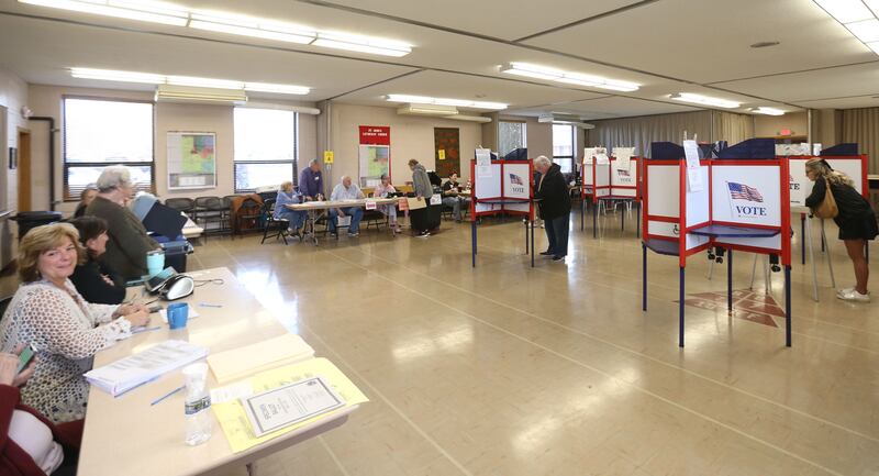 Voters fill their ballots on Tuesday, April 1, 2025 at St. Johns Lutheran Church in Peru.