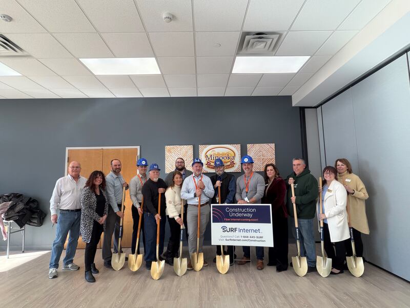 Surf Internet and the Village of Minooka officials celebrate a ceremonial groundbreaking for Surf’s expansion into Minooka. The event was held indoors due to cold temps, but was still warmly celebrated.