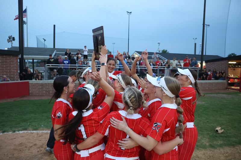 Bradley-Bourbonnais players hoist the trophy following the Boilermakers’ 7-1 victory in 11 innings over Rock Island in the IHSA Class 4A Bradley-Bourbonnais Regional championship on Friday, May 30, 2025.