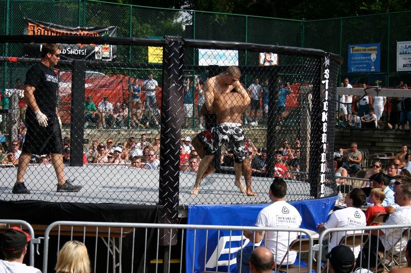 A fighter places a hold on his opponent during the XFO's Outdoor War at Sideouts Sports Tavern in Island Lake in 2010. Missed by fans, the event returns to Sideouts Aug. 9 after a six-year hiatus.