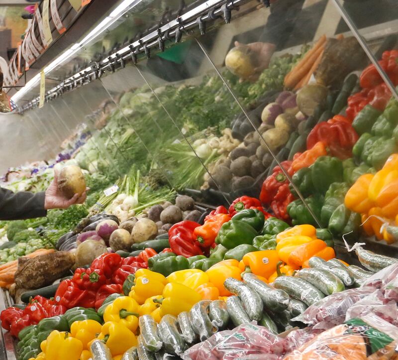 Ron Looze Sr., of Pell Lake, Wisconsin, shops for rutabagas Thursday, Nov. 17, 2022, at Angelo's Fresh Market, 4400 W. Elm St. in McHenry. Many small independent grocery stores are struggling with labor and rising food costs.
