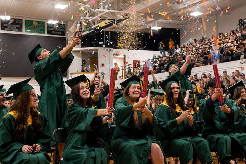 Confetti cannons go off as the Rock Falls High School Class of 2025 is announced Sunday, May 18, 2025, during commencement.