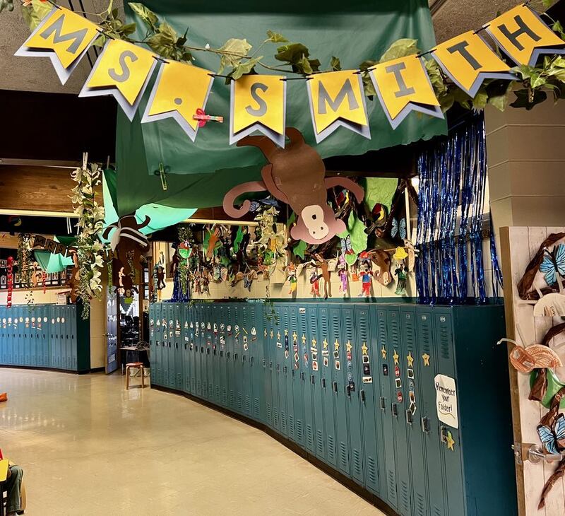 A paper monkey hangs in the hall of Sterling's Jefferson Elementary School where first-grade students recently spent six weeks learning about the rainforest.