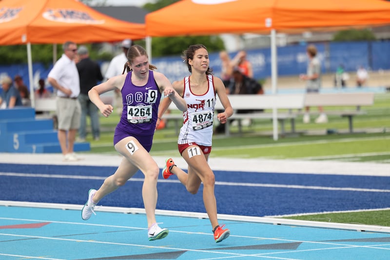 Plainfield North’s Marlie Czarniewski, right, and Downers Grove North's Alayna Todnem sprint the final stretch in the 1600 m run during the IHSA Class 3A Girls Track & Field State Finals on Saturday, May 24, 2025.