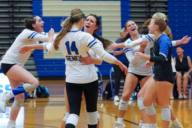 Geneva player celebrate after defeating Wheaton Warrenville South in two sets during a DuKane Conference match in Geneva on Tuesday, Sept. 16, 2025.