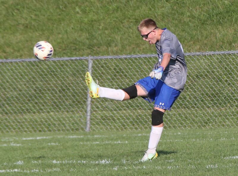 Princeton's Landon Davis boots the ball in the air against Ottawa on Tuesday, Oct. 3, 2023 at Ottawa High School.