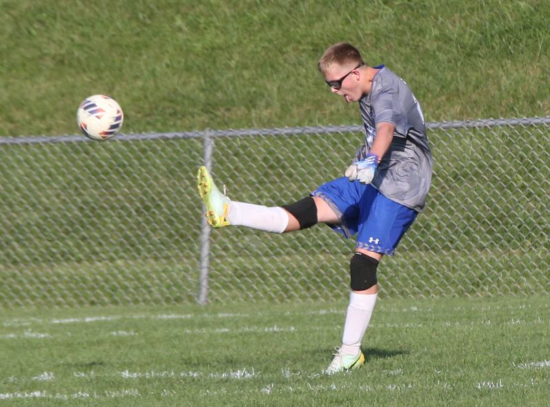 Princeton's Landon Davis boots the ball in the air against Ottawa on Tuesday, Oct. 3, 2023 at Ottawa High School.