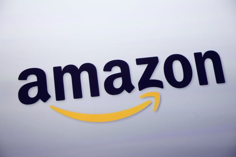 FILE - The Amazon logo is displayed at a news conference in New York on Sept. 28, 2011. (AP Photo/Mark Lennihan, File)
