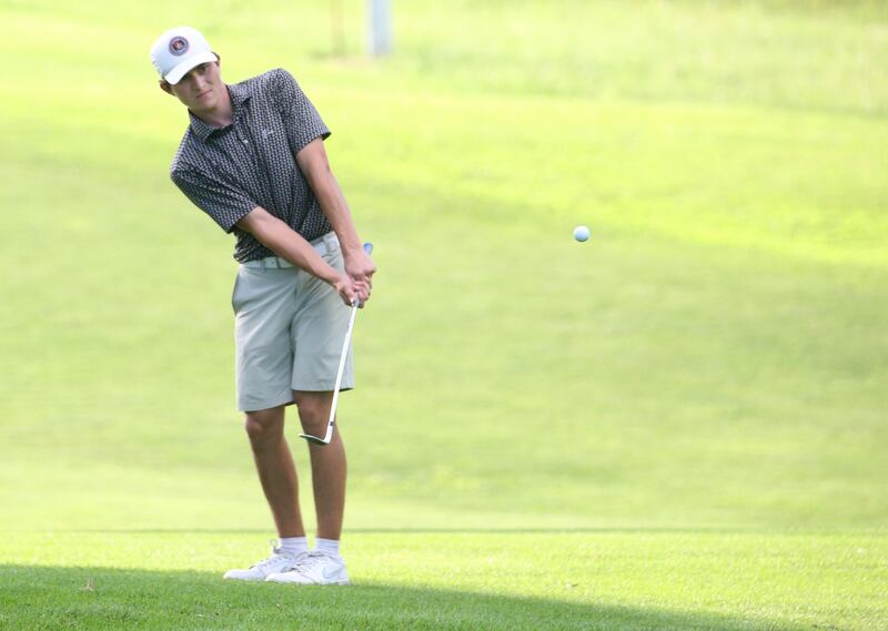 Chandler Creedon aims for the green during the Illinois Valley Mens Golf Championship Tournament on Sunday, July 27, 2025 at Spring Creek Golf Course in Spring Valley.