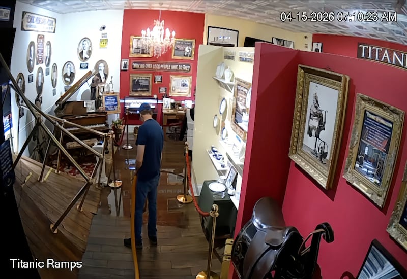 Image taken from security footage of Volo Museum employee, Gary Uhland, using a shopvac to help clean up the flooding that occured at the Titanic exhibit on April 15, 2026.