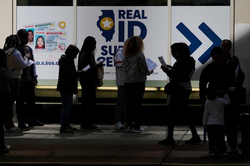 People line up to apply for Real ID at a Real ID Supercenter in downtown Chicago, Tuesday, May 6, 2025.