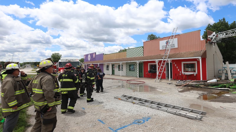Fire companies battle blaze at Utica strip mall