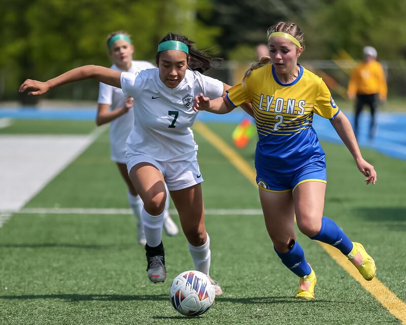 Glenbard West's Lauren Escalante (7) defends Lyons Township's Josie Pochocki (2) during Class 3A Lyons Regional final soccer match between Glenbard West at Lyons Township.  May 21, 2023.