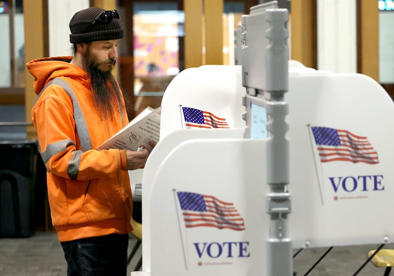 Glenn Runkle, from DeKalb, votes Tuesday, April 1, 2025, in the polling place at the Westminster Presbyterian Church in DeKalb.