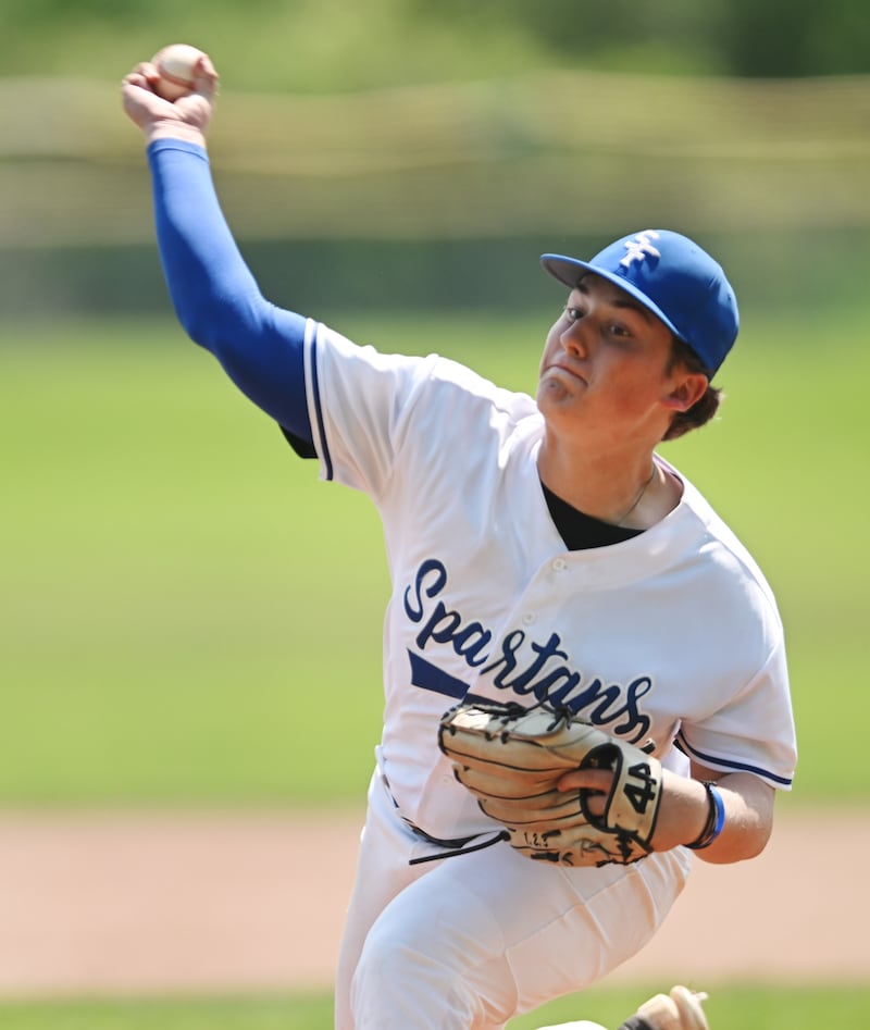 St. Francis starting pitcher Peter Solloway delivers during Saturday’s game against Marmion.