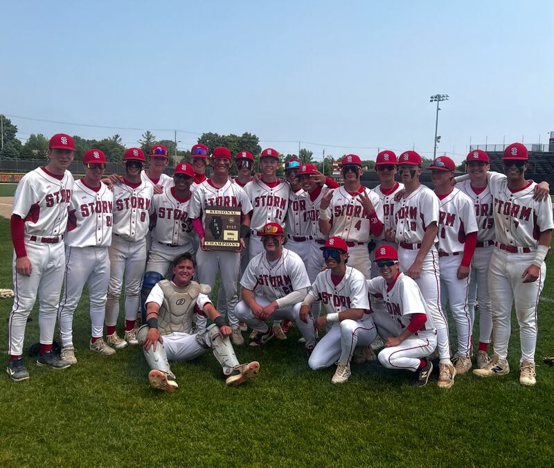 The South Elgin baseball team poses with the regional plaque after beating St. Charles North to win the Class 4A Batavia Regional title.