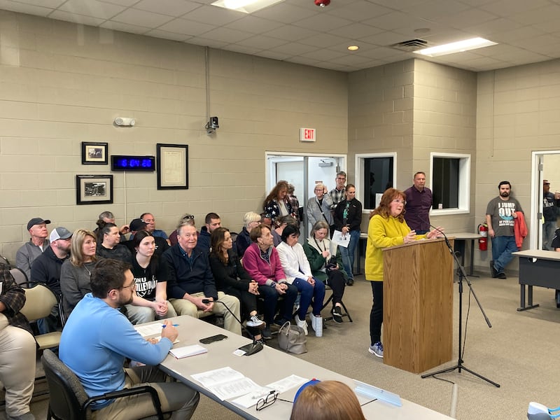 Residents fill the board room at Monday night's Manteno Board of Trustees meeting. There were also some people seated in the auxiliary room to view the proceedings on video.